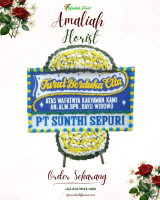 Papan Bunga Duka di Padang Pasir
