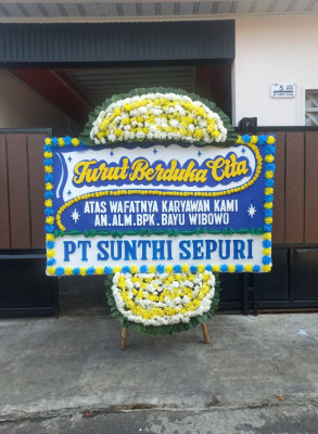 Papan Bunga Duka di Padang Pasir
